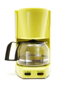 Green coffee maker isolated on a white background.